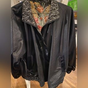 This jacket is absolutely beautiful. Can be worn on colorful side or black.